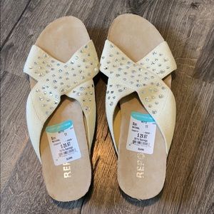 Report cream slide sandals, jewel accents. NWT